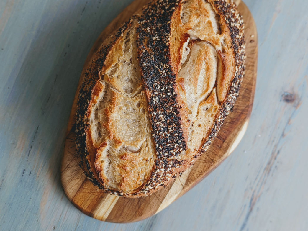 Loaf of bread on a wooden cutting board