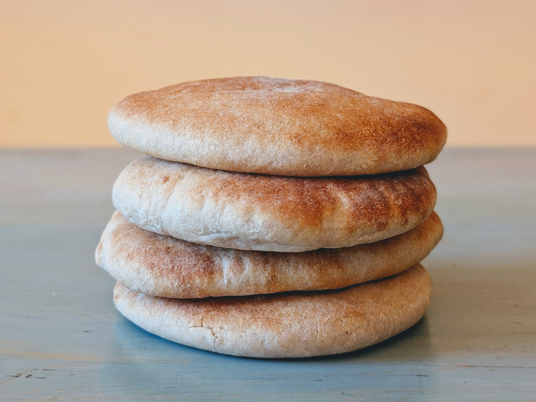 Stacked pita bread on a table