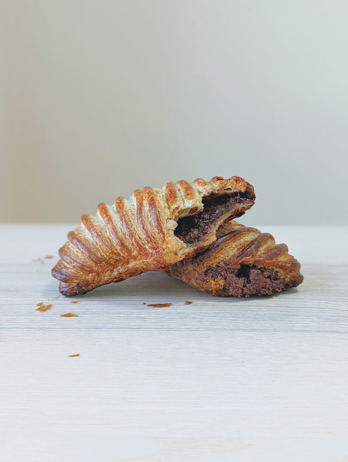 Chocolate Avalanche Croissant showing flaky exterior and chocolate filling