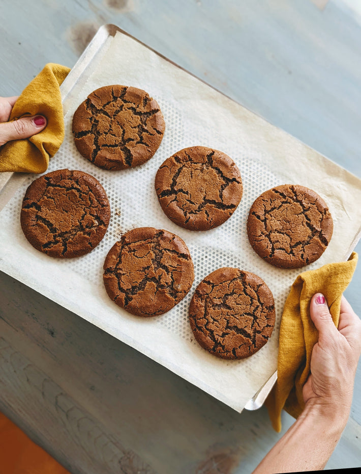 Freshly baked Giant Ginger Molasses Cookies on a baking tray