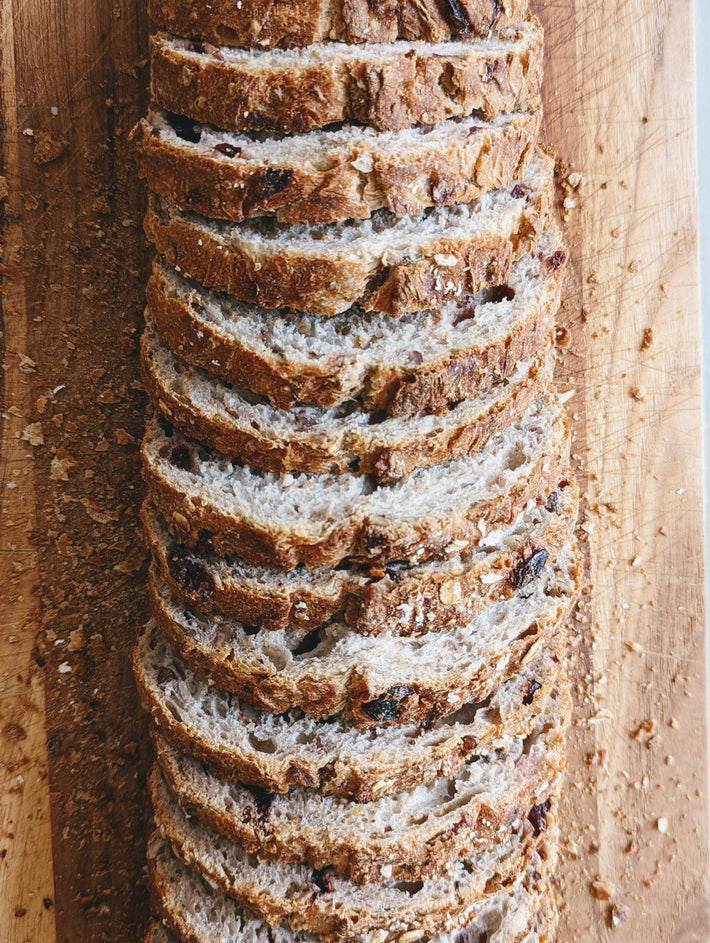 Close-up of sliced bread on a wooden cutting board