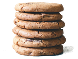 Front of Gluten-Free Giant Chocolate Chunk Cookies (6-pack) stacked with visible chocolate chunks on white background