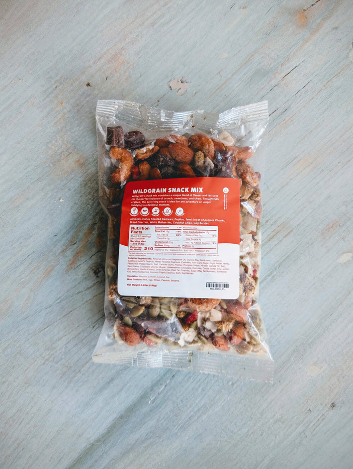 Bag of Wildgrain Snack Mix with red label: WILDGRAIN SNACK MIX; Nutrition Facts; Calories 210; Net Weight 5.25oz (150g)