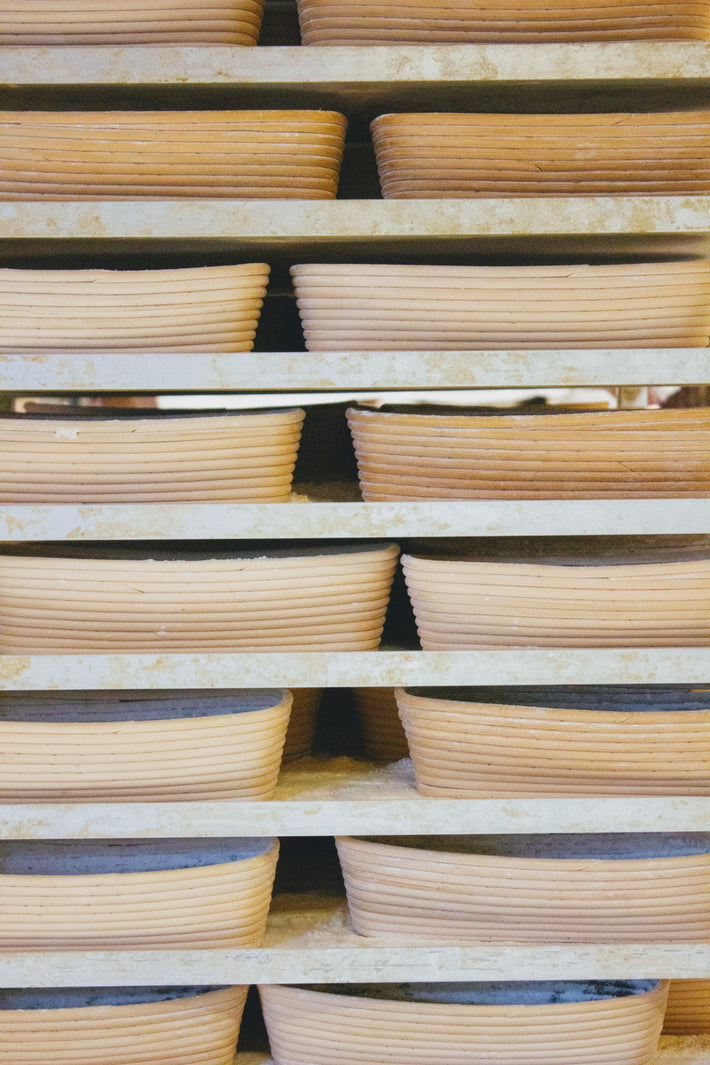 Stacked bread proofing baskets used for sourdough fermentation