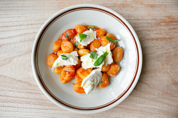 Potato Gnocchi topped with mozzarella and basil